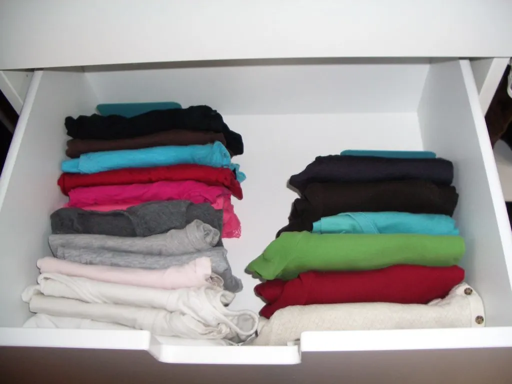 rolled up t-shirts in a drawer