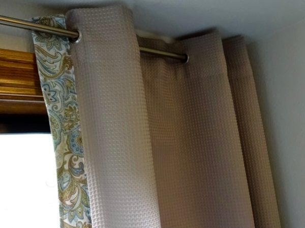 Make drapes from a shower curtain