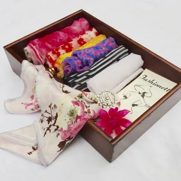 Use trays to store scarves