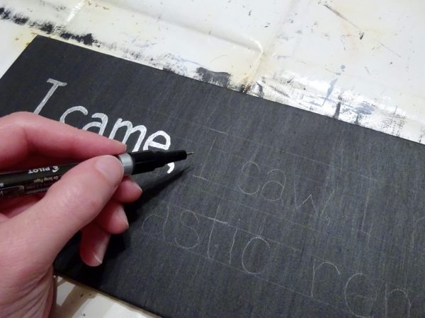Hand lettering a sign