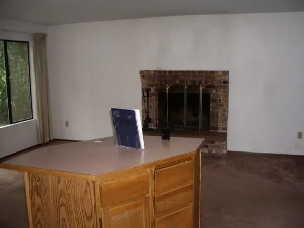 Outdated living room fireplace