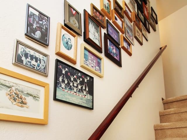 DIY stairway photo wall