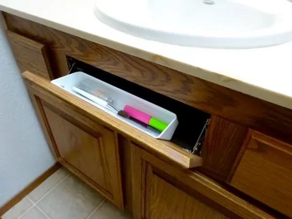 Tip out tray under sink