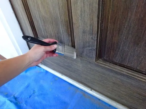 Clean a wood door before staining