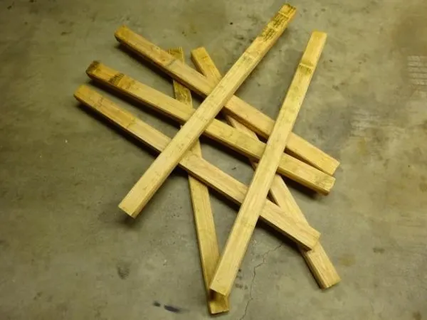 Wooden fence posts in a pile