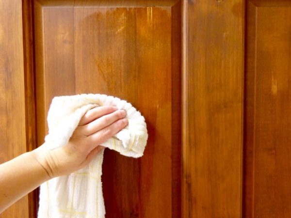 Treat a wood door with preservative