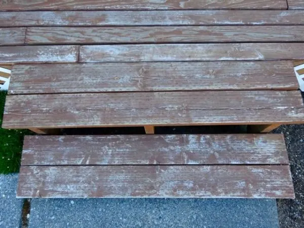 Weathered deck boards in need of stain