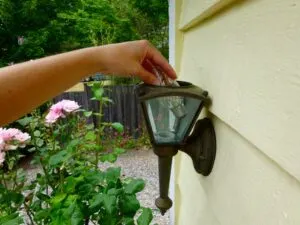 Replace exterior light bulbs