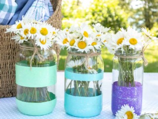 painted mason jars with acrylic paint stripes full of daisies