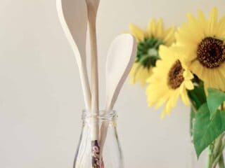 decorative wooden spoons in glass jar as gift