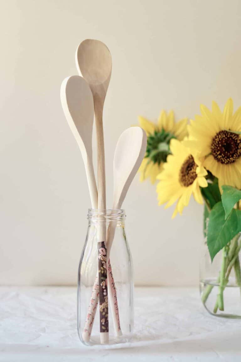 decorative wooden spoons in glass jar as gift
