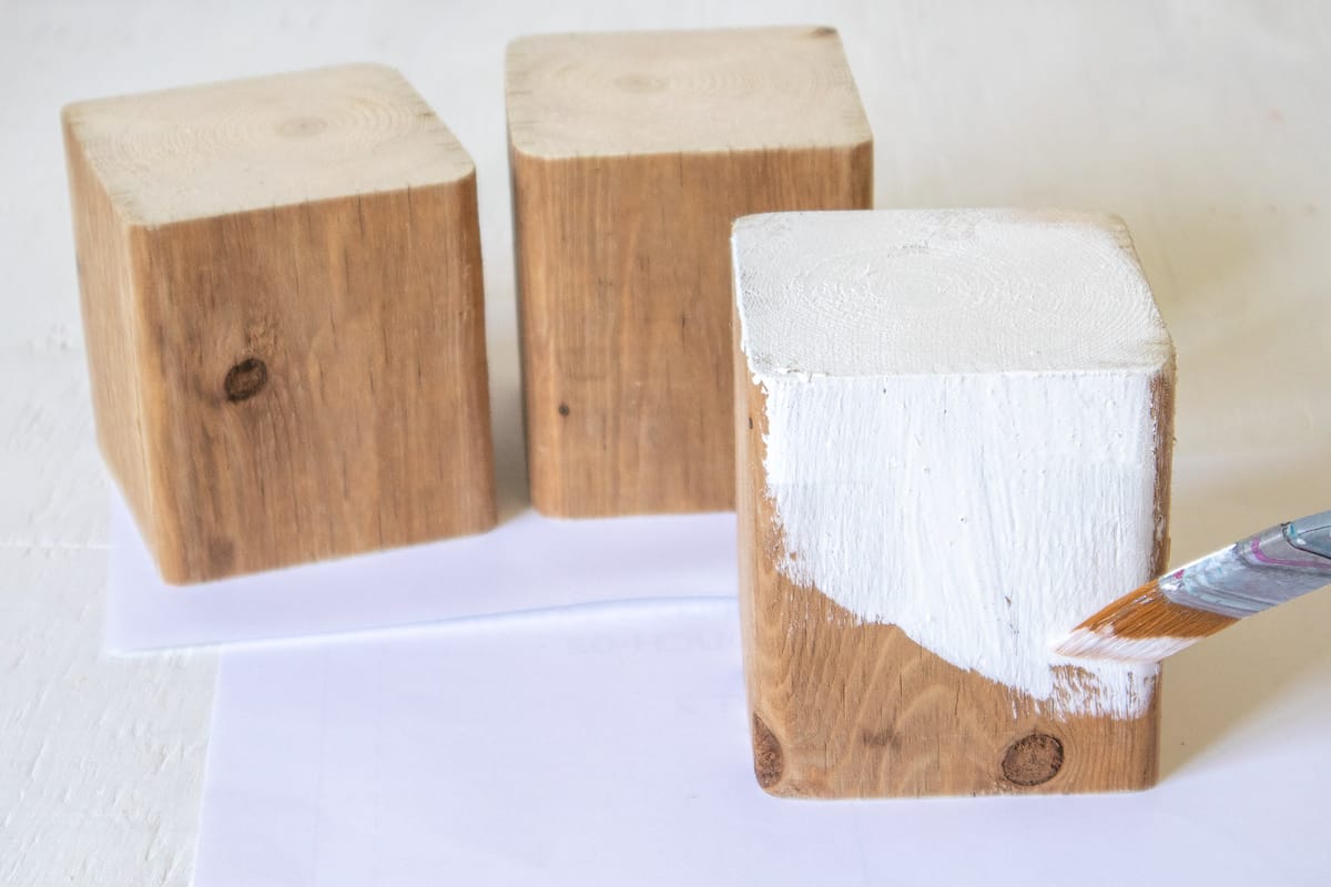 painting wood blocks with white paint