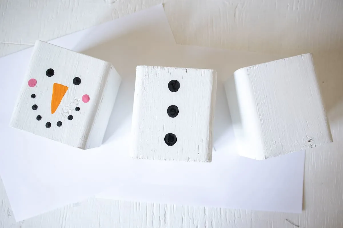 painted wood blocks with Snowman face and torso