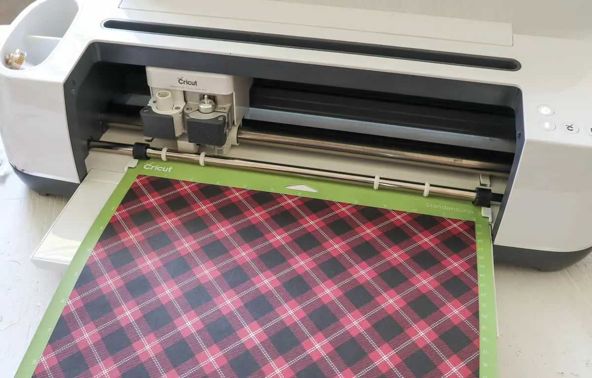 sheet of buffalo check plaid holiday paper in Cricut