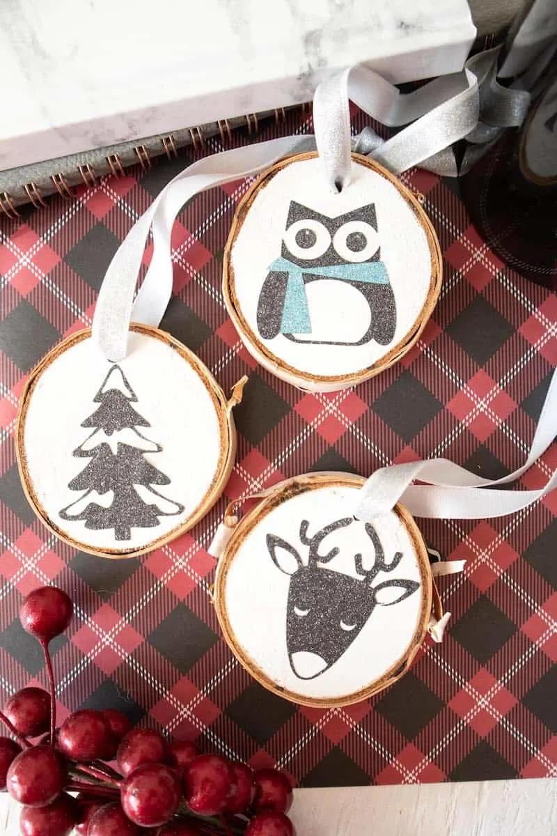 Easy Wood Slice Ornaments with a Cricut & Iron-On - The Homes I