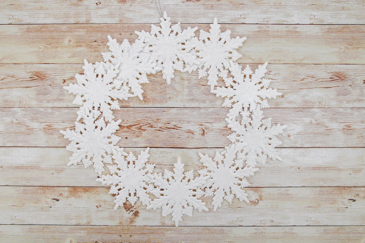 snowflake wreath on wooden table