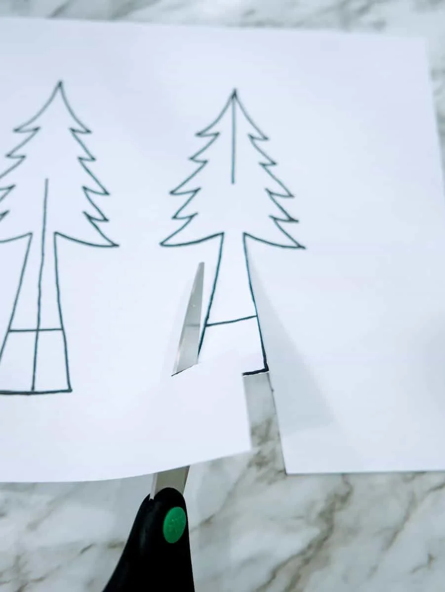 Cutting Christmas trees out of paper