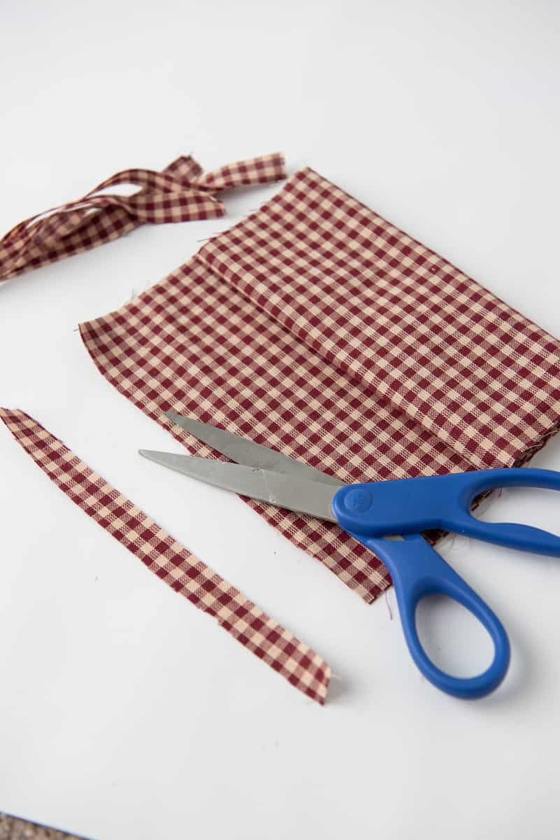 Cutting Checkered Fabric with Scissors