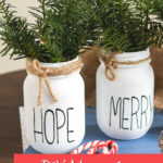 mason jar Christmas centerpieces with greenery