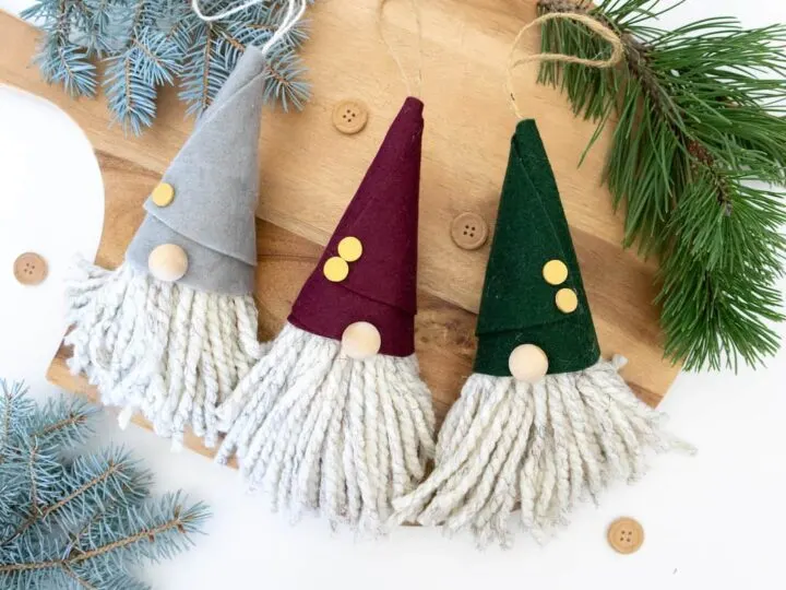 felt Gnome Ornaments on wooden background