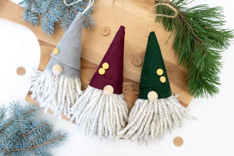 felt Gnome Ornaments on wooden background