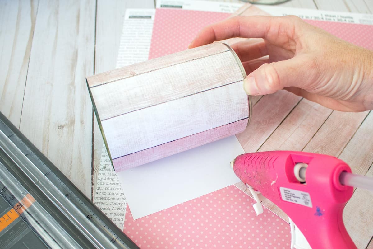 Hot Glueing Scrapbook Paper to Tin Can