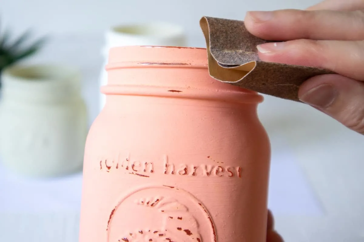 distressing painted mason jar rim with sandpaper