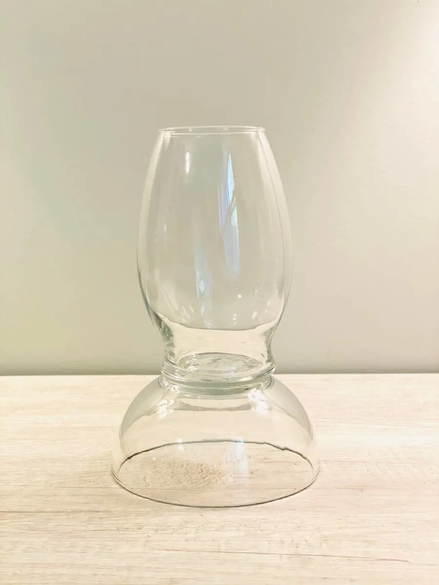 glass vase and glass bowl glued together for a hurricane lamp