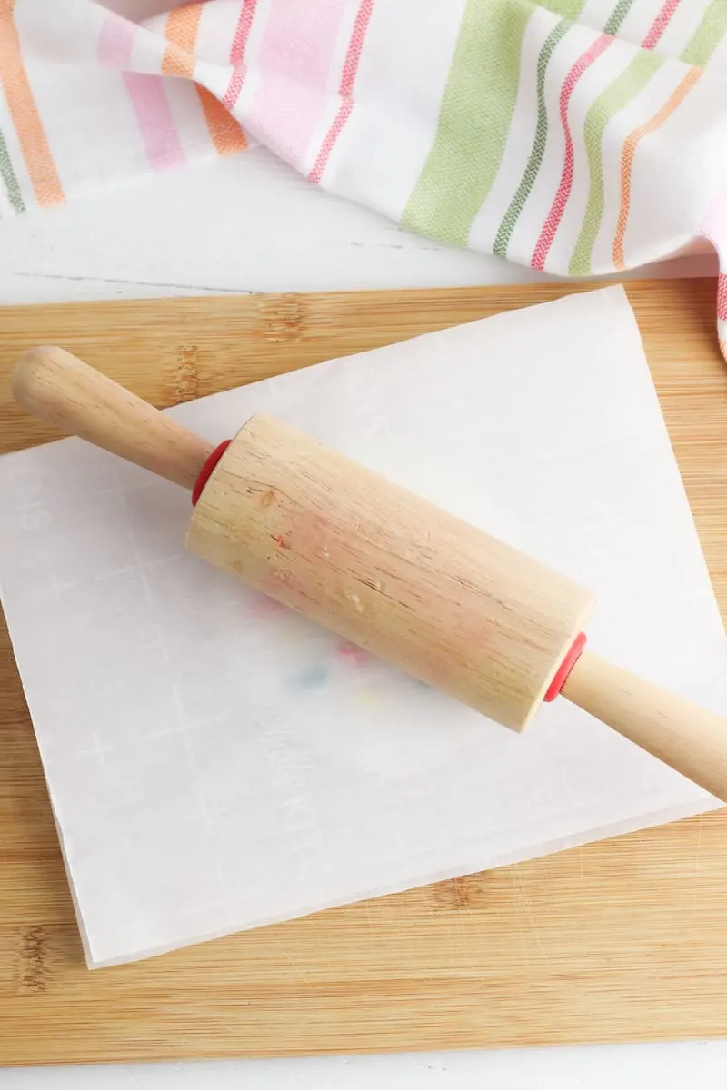 Flattening Clay with Rolling Pin