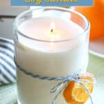Homemade hand poured soy candle with orange decoration