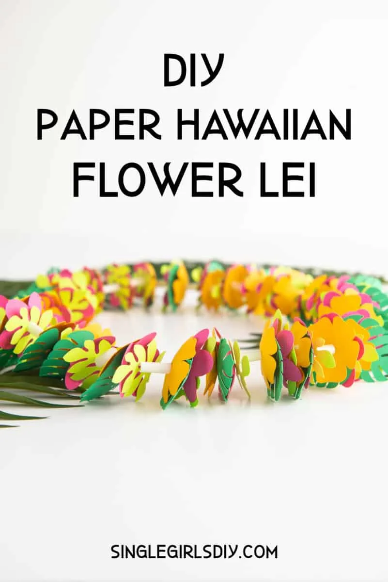 paper flower lei on against white background