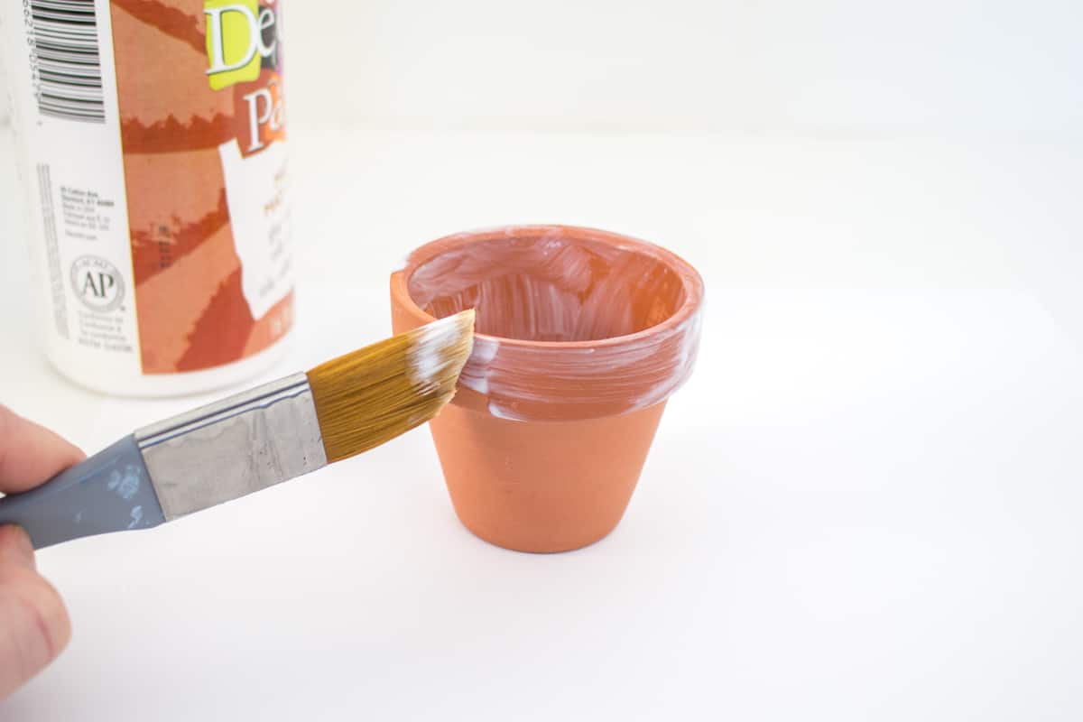 Painting terracotta pot with Mod Podge