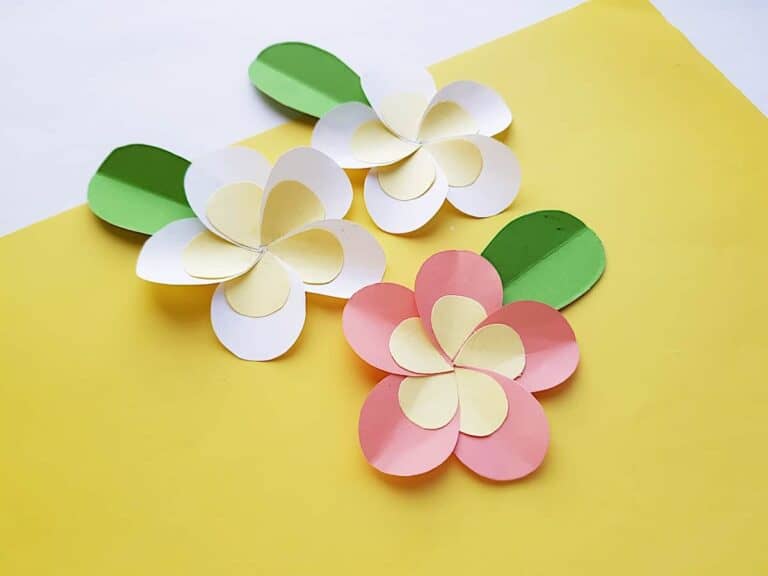 Paper Plumeria on Yellow Background