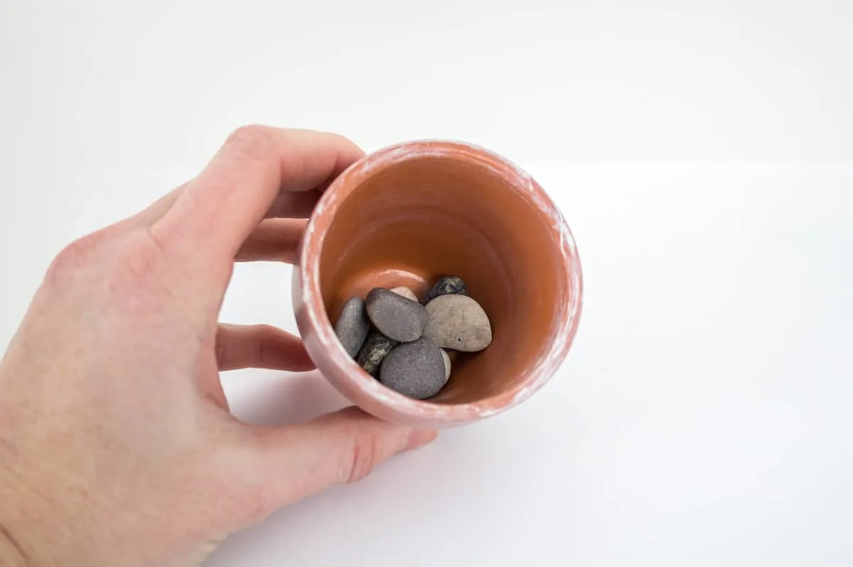 Pebbles in terracotta pot craft