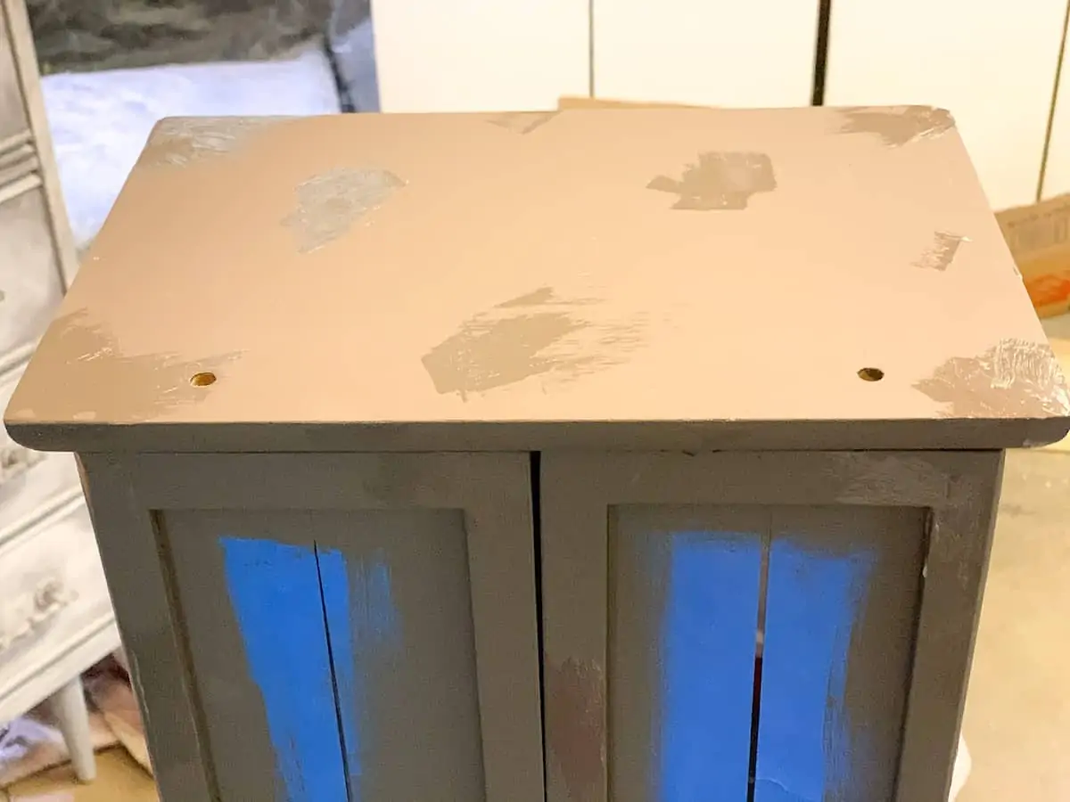 Vaseline on furniture for distressed paint DIY