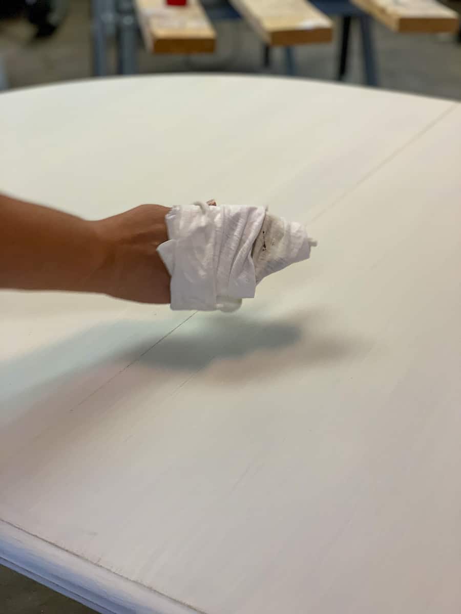 Wiping stain wax on table