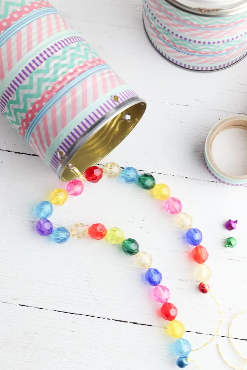 colorful bead strung on tin can
