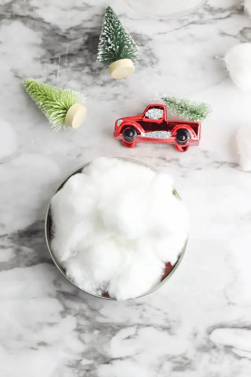 cotton balls glued to the inside of a mason jar lid