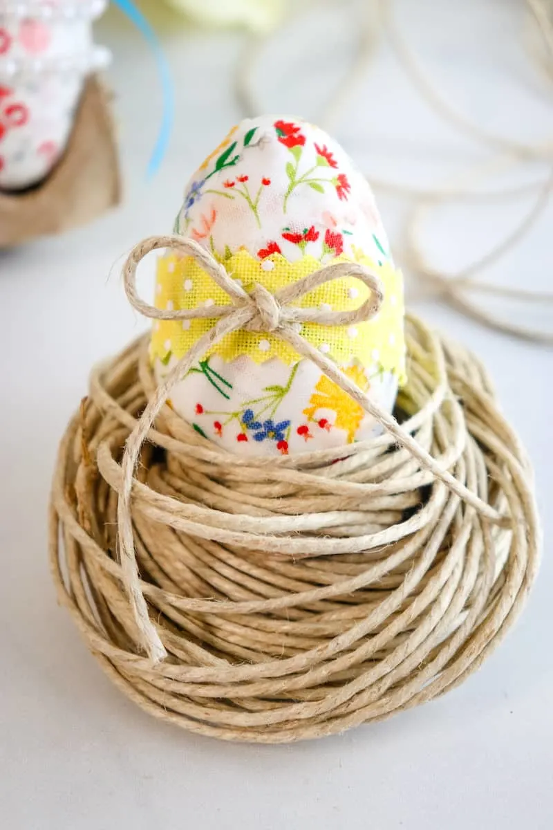 Decoupage Easter Eggs sitting in twine nest