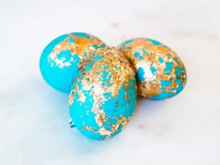 Gilded Easter Egg on white background