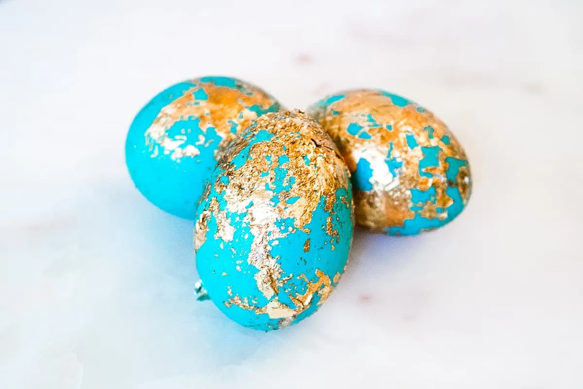 Gilded Easter Egg on white background