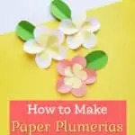 three colorful DIY paper plumerias on yellow background