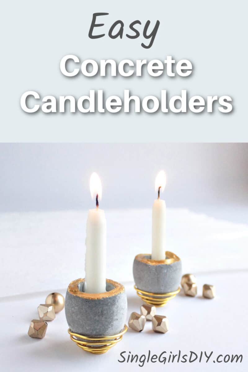 small cement candleholders with taper candles