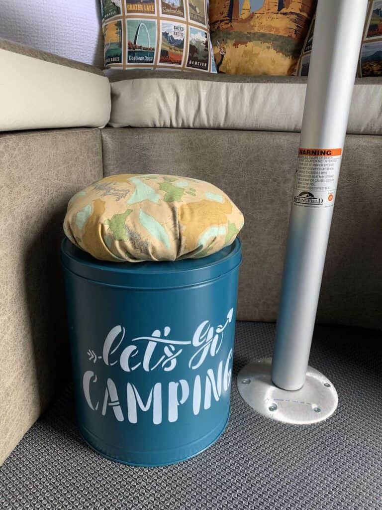 diy popcorn tin storage container under RV table