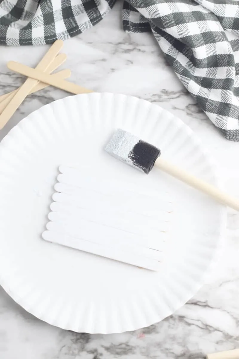 painting popsicle stick pallet white