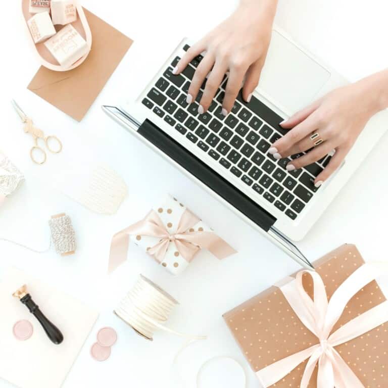 woman searching for gift certificate downloads on computer