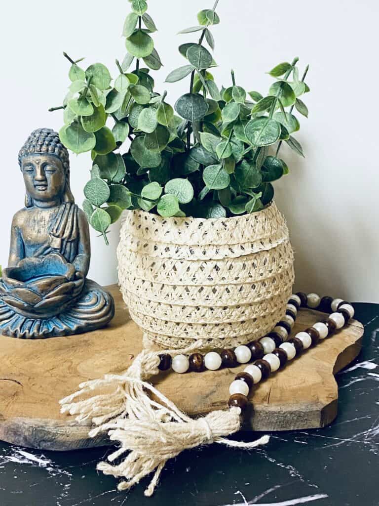 boho vase filled with greenery