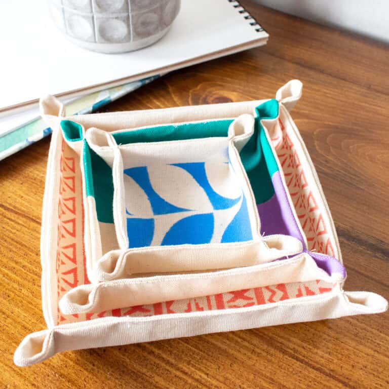 three fabric trays nestled inside each other