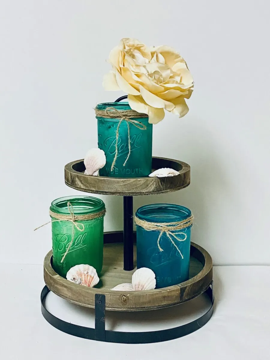 https://singlegirlsdiy.com/wp-content/uploads/2021/08/Tiered-tray-with-painted-sea-glass-mason-jars-900x1200.jpg.webp