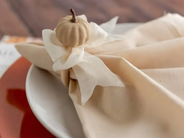 handmade fall napkin holder with a pumpkin and ribbon